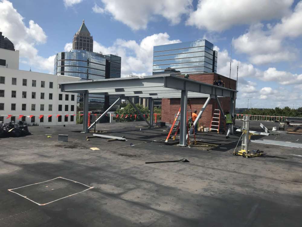 structural steel canopy in parking area