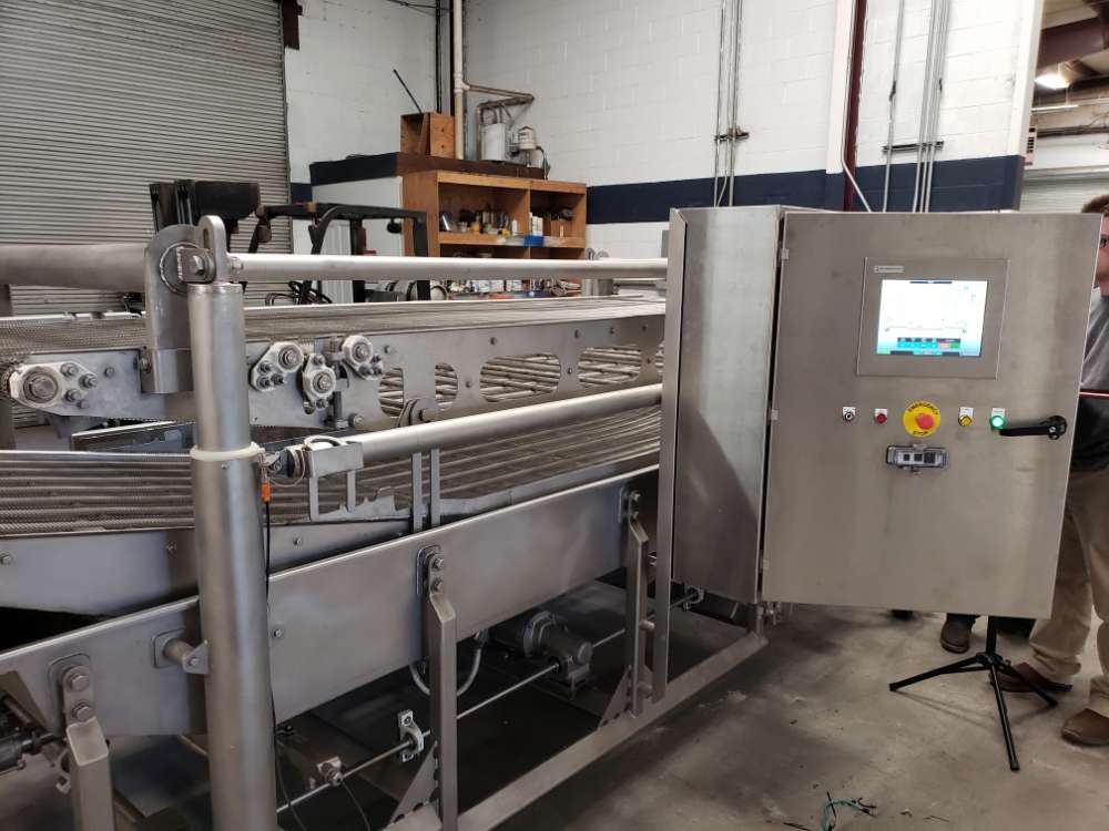 large industrial machinery with process control panel